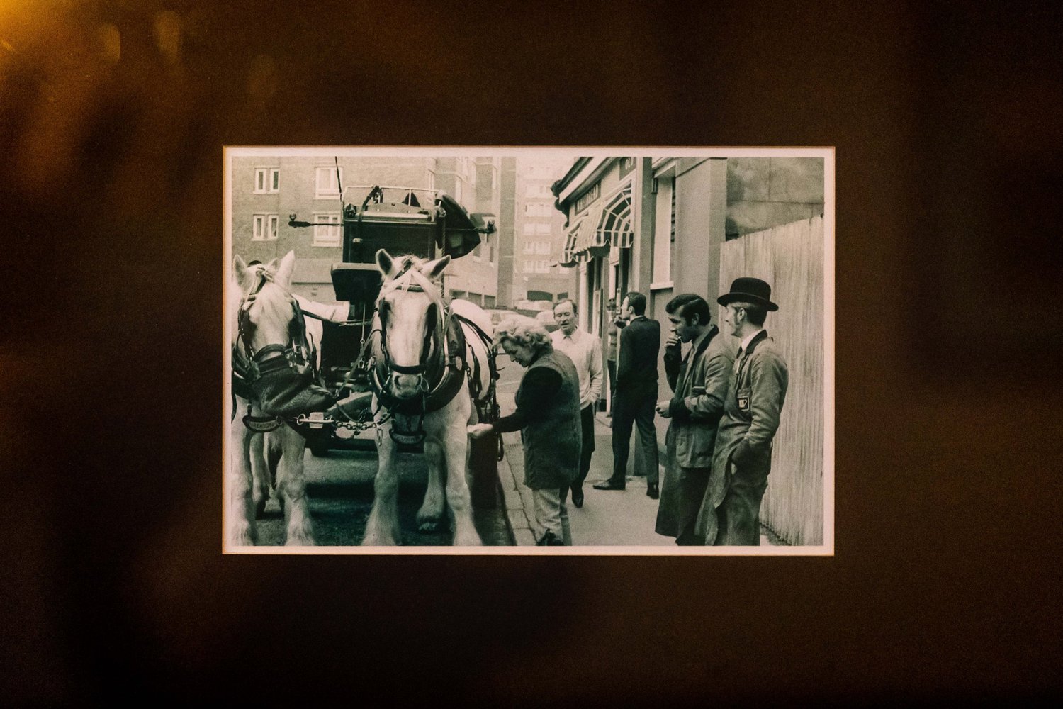 A historic photograph of brewery dray horses outside the pub